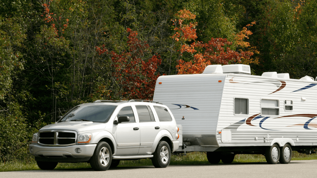 SUV towing travel trailer