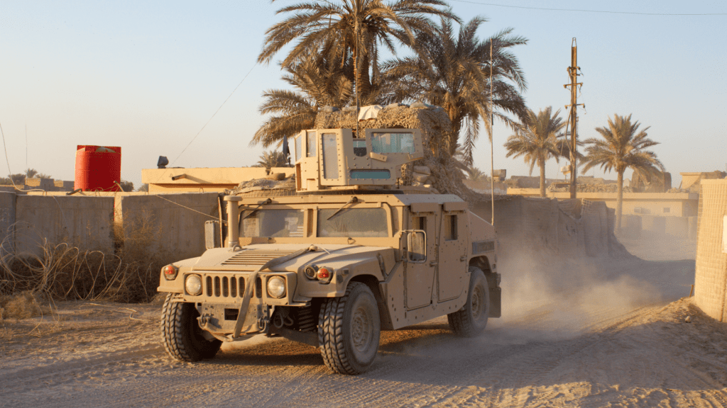 Humvee driving in desert