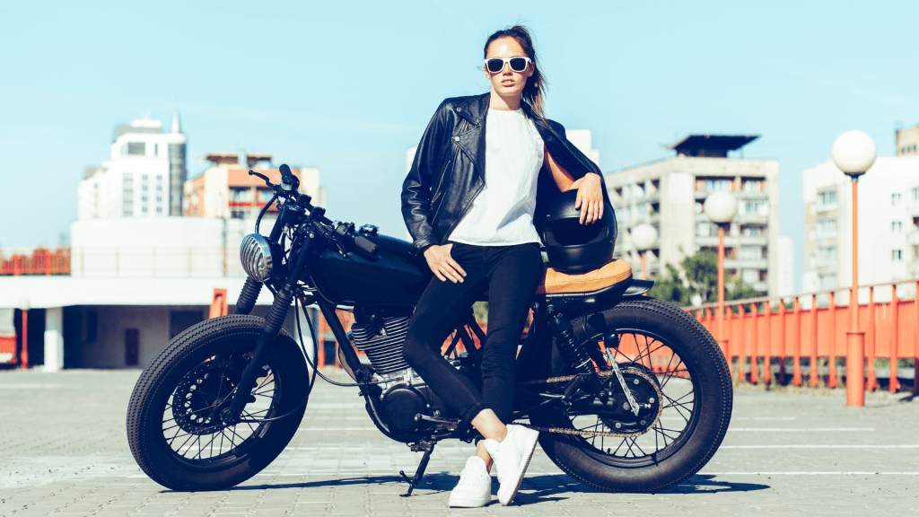 Female biker in leather jacket