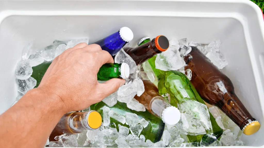 Getting drink from cooler