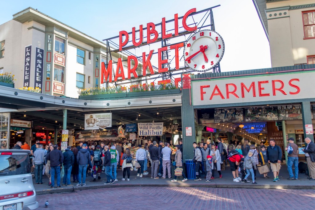 A crowd gathers at Pike Place Market in Seattle