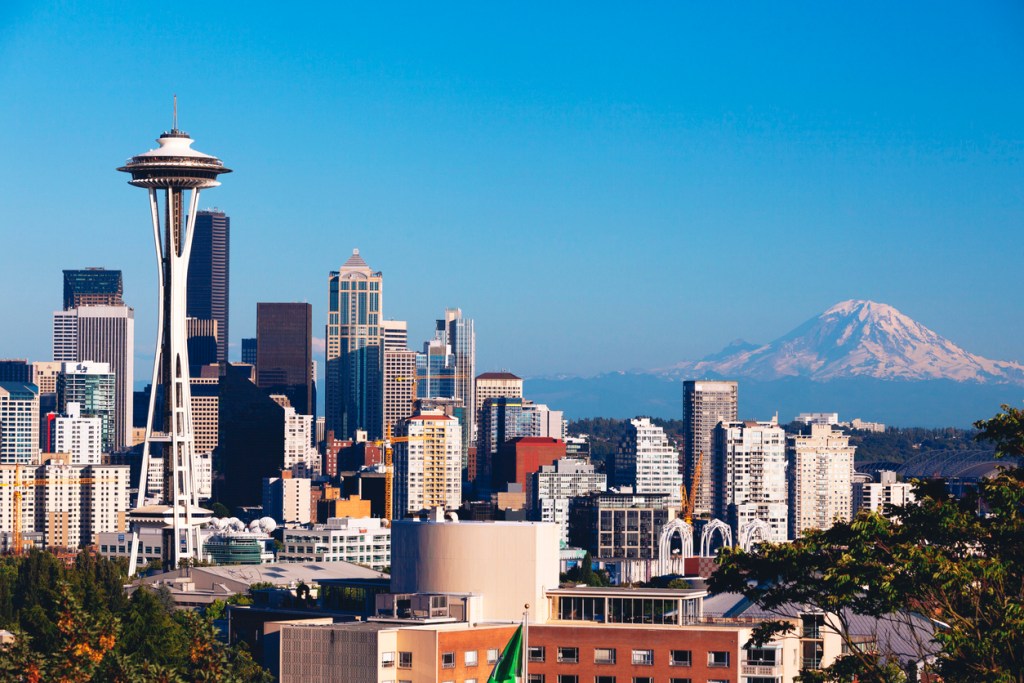 Skyline of Seattle with Mt. Rainier in background. Bumbershoot has been held in Seattle since the early 1970s.