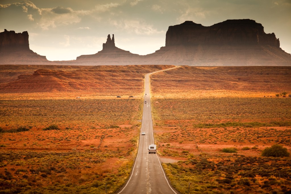 Motor home camper on vacation in the southwest USA red rock landscape near Monument Valley Arizona