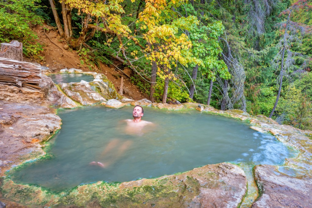 Photograph of man relaxing in a hot spring. Avoid sinning in a hot spring so that others can enjoy it too.