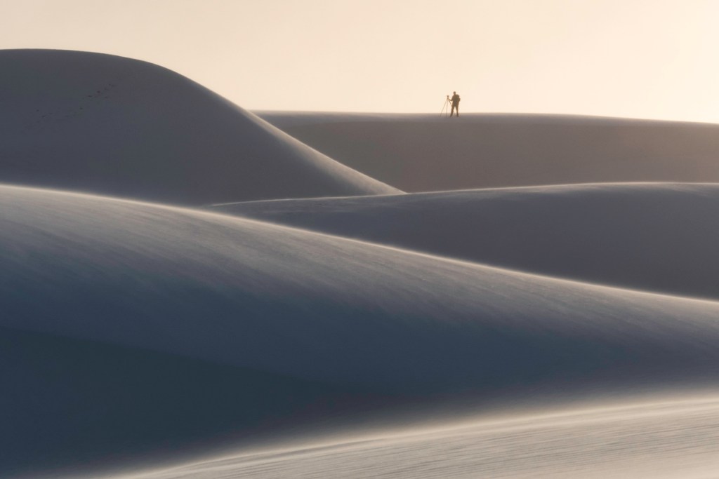 A photo of the dunes at sunset in White Sands National Monument, New Mexico.