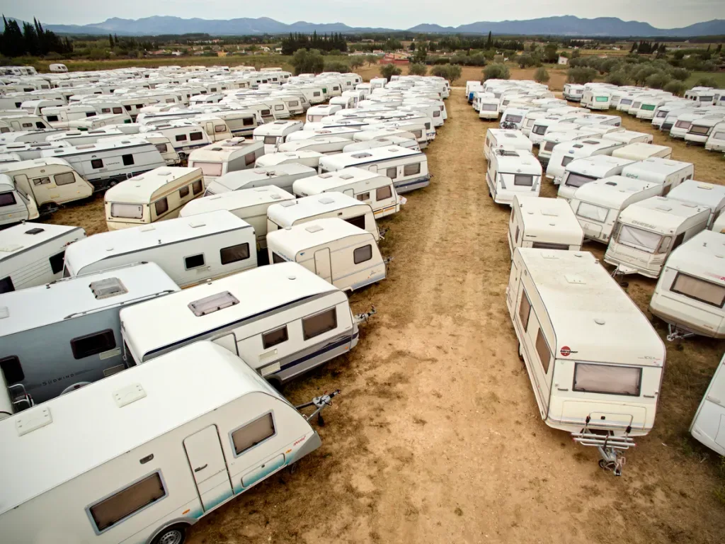 A photo showing a packed RV dealer lot, representing the oversaturated market that may have cause the Grand Design layoffs