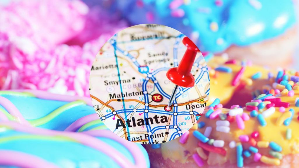A map showing a red pin on Atlanta, Georgia, with a background of brightly decorated doughnuts.