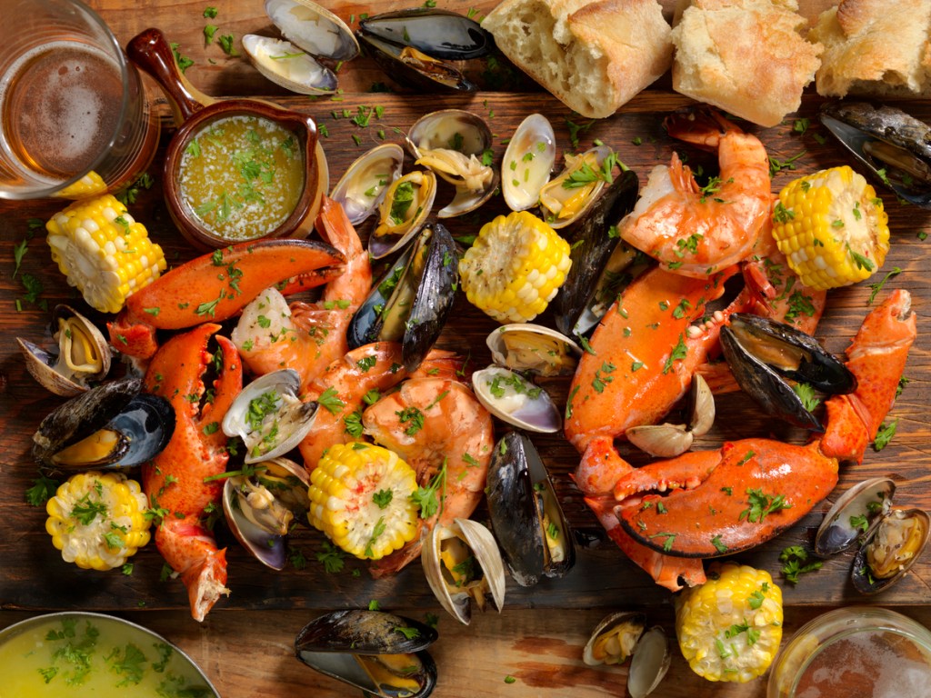Shellfish Feast with Lobster, Tiger Prawns, Clams, Mussels, Vegetables and a couple Beers - all of which you might find at the North Carolina Seafood Festival