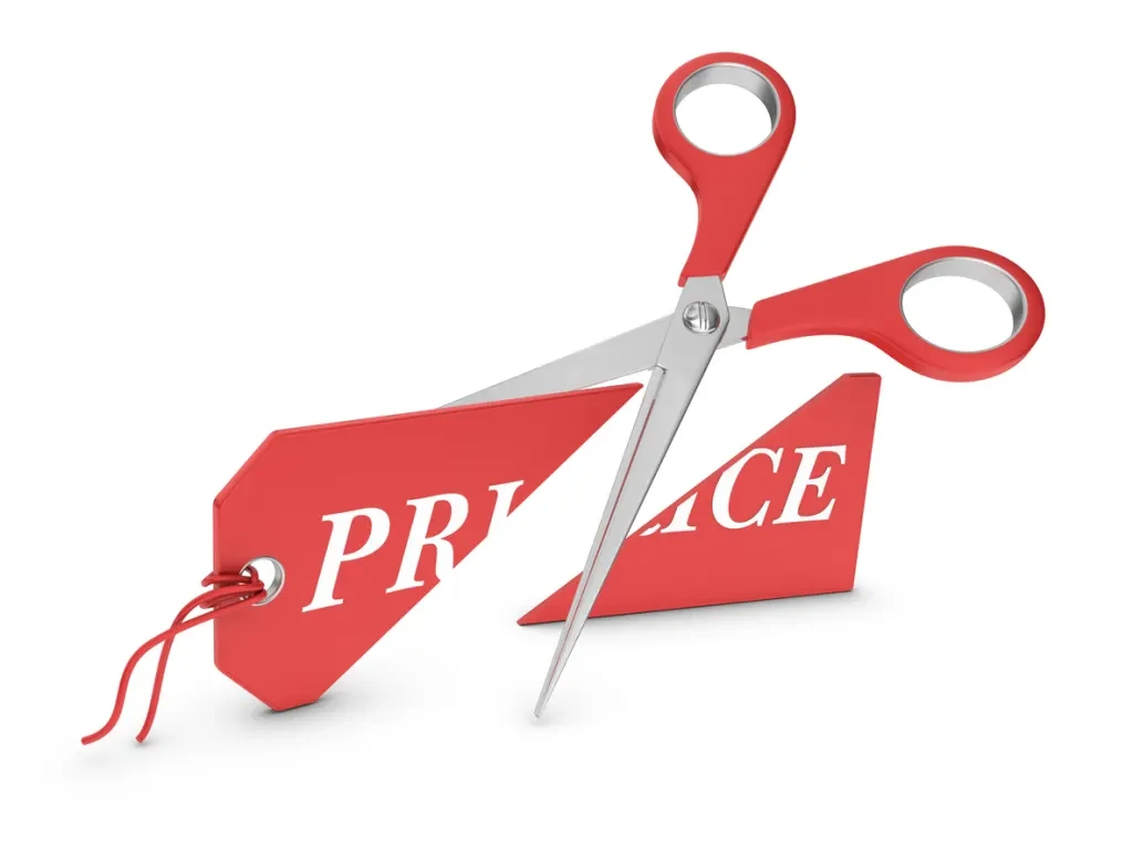 Scissors cutting a price tag in half. Will RV dealers be offering price cuts?
