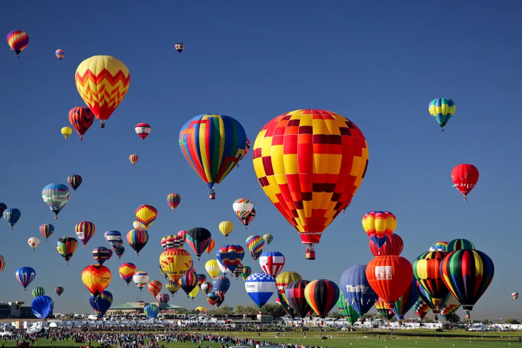 Dozens of hot air balloons lift off during the annual Albuquerque International Balloon Fiesta.