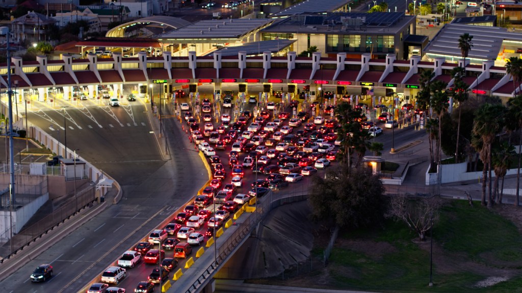 Cars waiting to cross the border into Mexico.