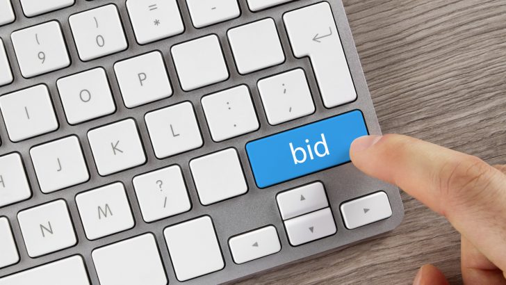 Bid Button on Computer Keyboard. Slotin Auction House currently only offers online bidding.