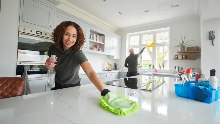 A professional cleaning team in a kitchen - they probably have great tips