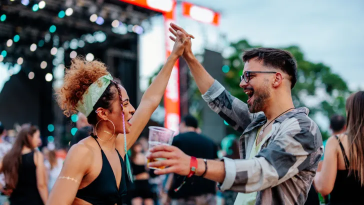 Couple dancing at a music festival
