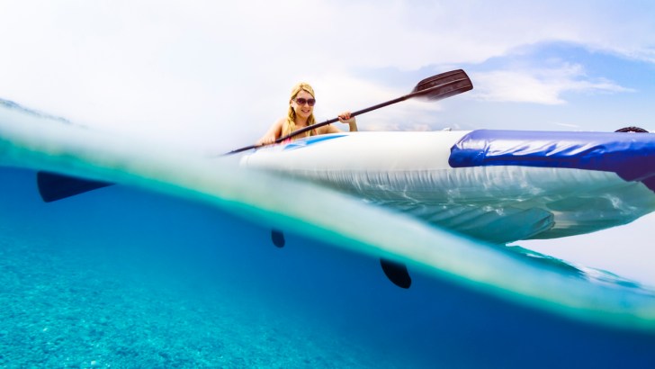 A woman on a type of kayak that's inflatable