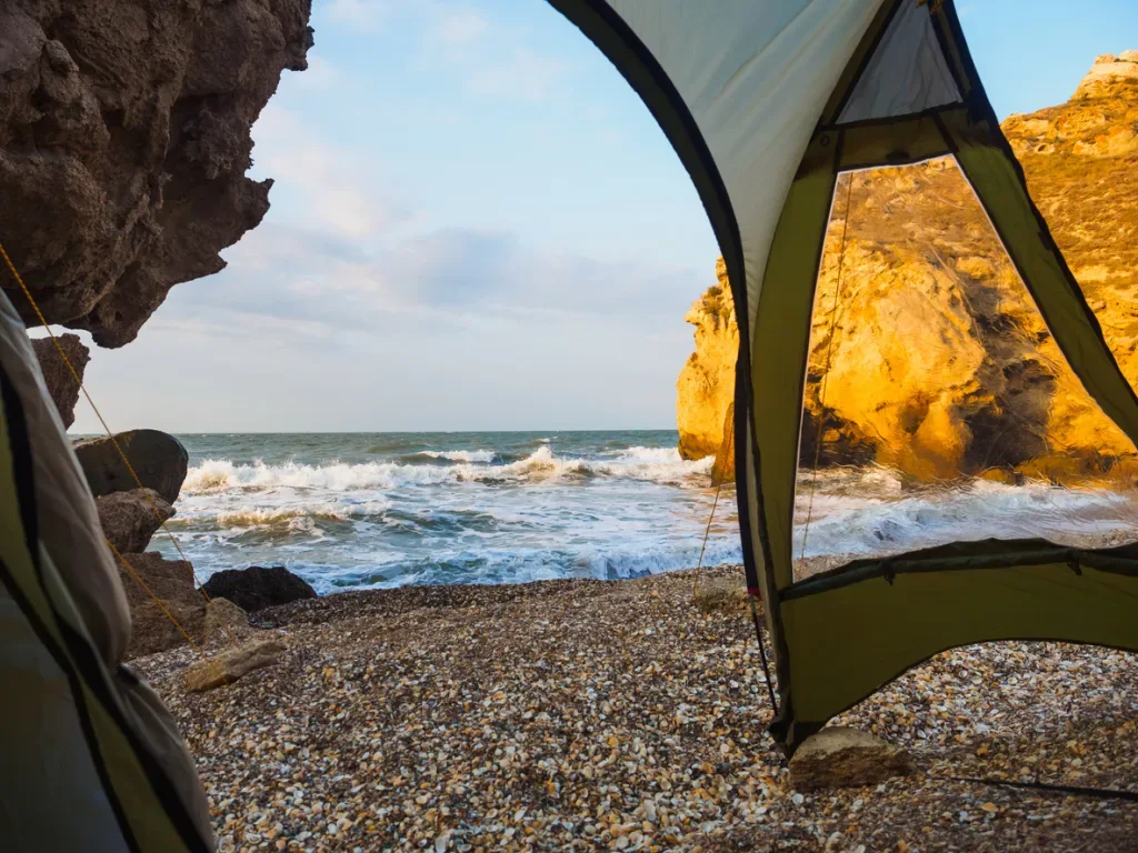 A waterfront view from a cheap clam tent on the beach.