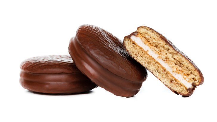 A fallen stack of MoonPies against a white background.