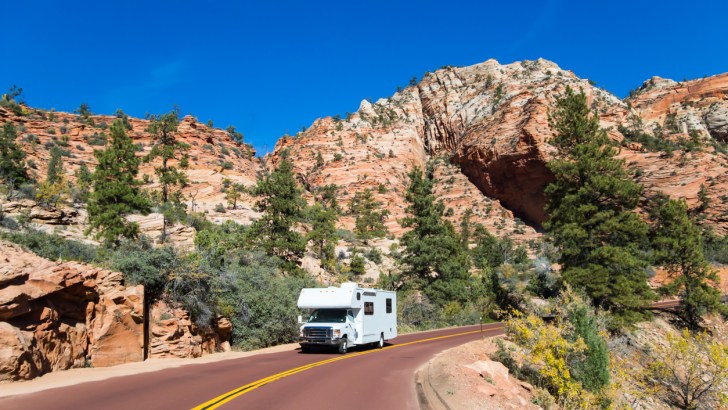 A Class C RV driving through Zion just like you could in Grand Design's new Lineage