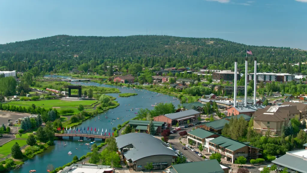 An aerial view of downtown Bend, includes the Old Mill District, one of the city's top free attractions.